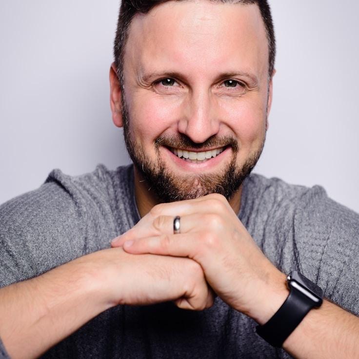 Kaveri Mehta, Lead Design Curator at MoonlitMeadowHub, reviewing corporate floral arrangements